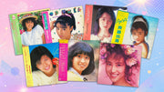 Seven 1980s Japanese female idol vinyl records arranged against a pastel pink and blue background